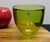 2pc Art Glass Collection: Signed Orrefors Green Bowl & Cobalt Blue Hurricane Elevate your home décor with this curated...