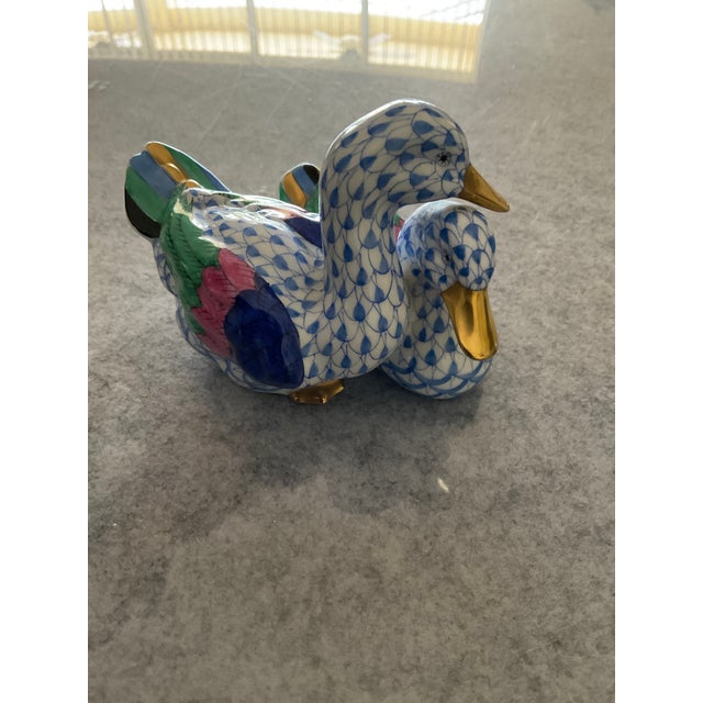 Herend Rust Fishnet pair of hand painted ducks figurines measuring 2.75" x 4.25" x 3". The beaks, webbed foot , and...