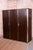 This elegant three-door wardrobe is a representative piece from the renowned manufacturer Vichr a spol. in Lysá nad Labem,...