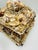 This is a decorative shell-encrusted box, a coastal folk-art style piece. The wooden box is completely covered in an...