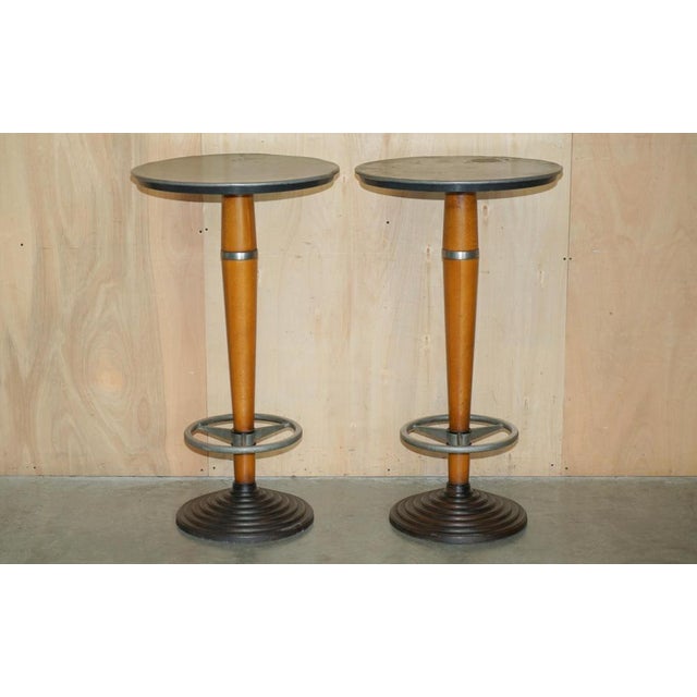 A super rare suite of Art Deco bar stools with brown leather tops and matching zinc topped table. They are super rare and...