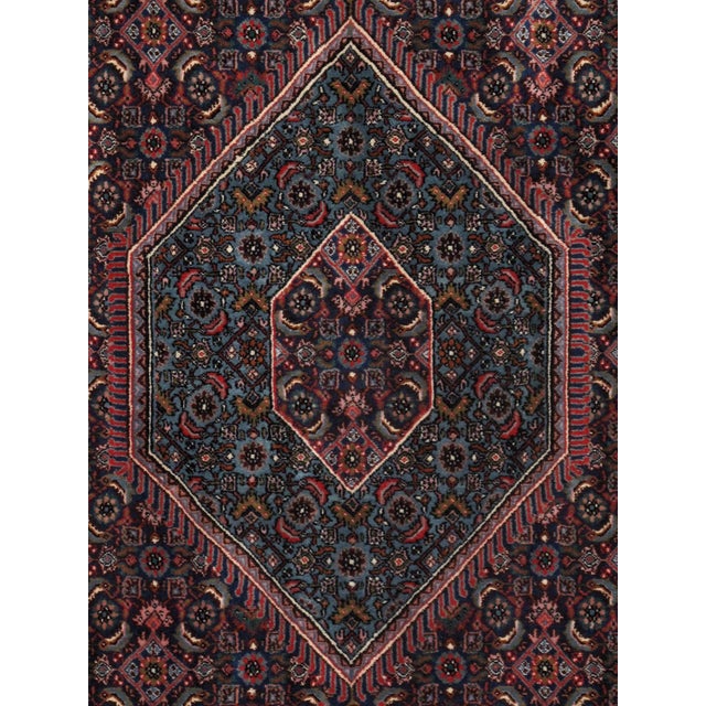Inspired by centuries of traditional rug-weaving artistry, this handcrafted rug features timeless patterns, rich colors,...