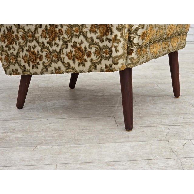 1970s, Danish highback armchair. Brown/beige furniture fabric, teak wood legs, springs in the seat. Original very good...