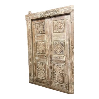 Antique Indian Om Carved Double Door | Whitewashed Vintage Exterior Statement Doors For Sale