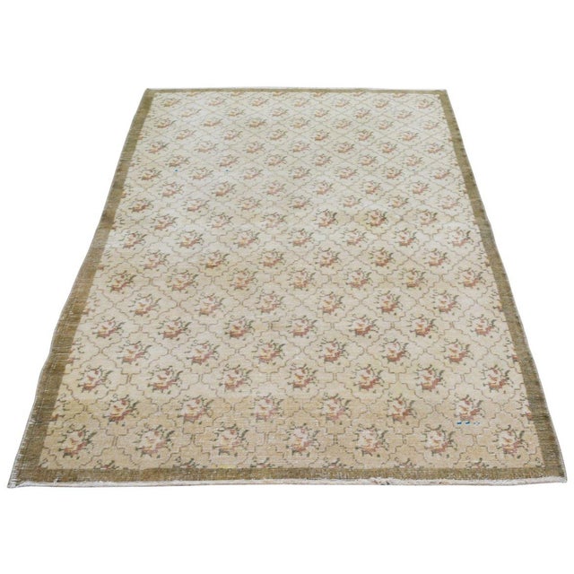 Hand-knotted with care using traditional rug-making techniques, this wool rug blends timeless craftsmanship with a modern...