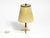 Beautiful small mid century brass table lamp with original pleated lampshade. the shade is made of thin plastic, almost...