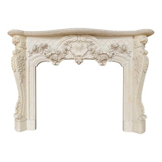 Lavish French Rococo Style Carved Fireplace Mantle with Floral Garland For Sale