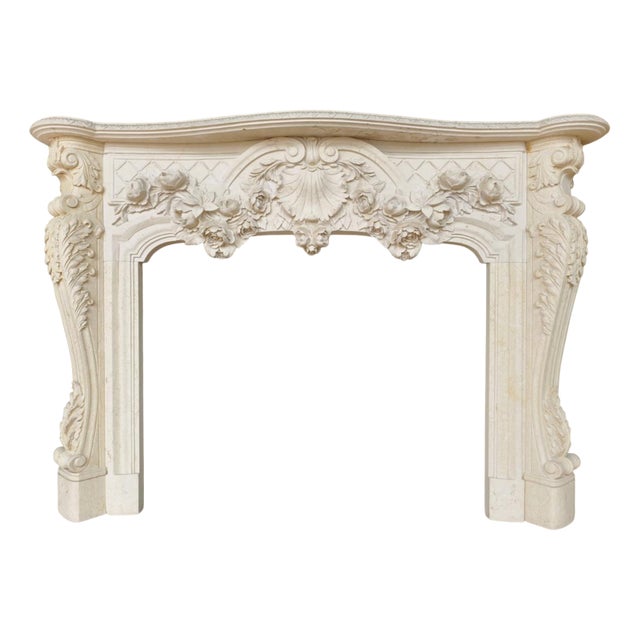 Lavish French Rococo Style Carved Fireplace Mantle with Floral Garland For Sale