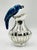 Whimsical silver-plated water pitcher designed and handcrafted in the 1960s by the renowned Los Fajardo workshop of Taxco,...