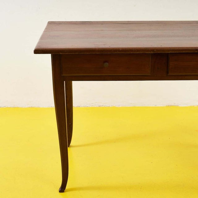 Discover a refined solid wood table, perfect for any space. With a simple yet elegant design, it features soft lines and...