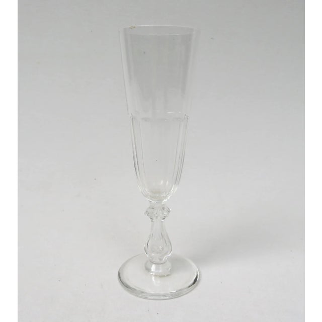 A set of 6 champagne flutes from the time of the Biedermeier. There are 3 pairs in the set available, each of which are...
