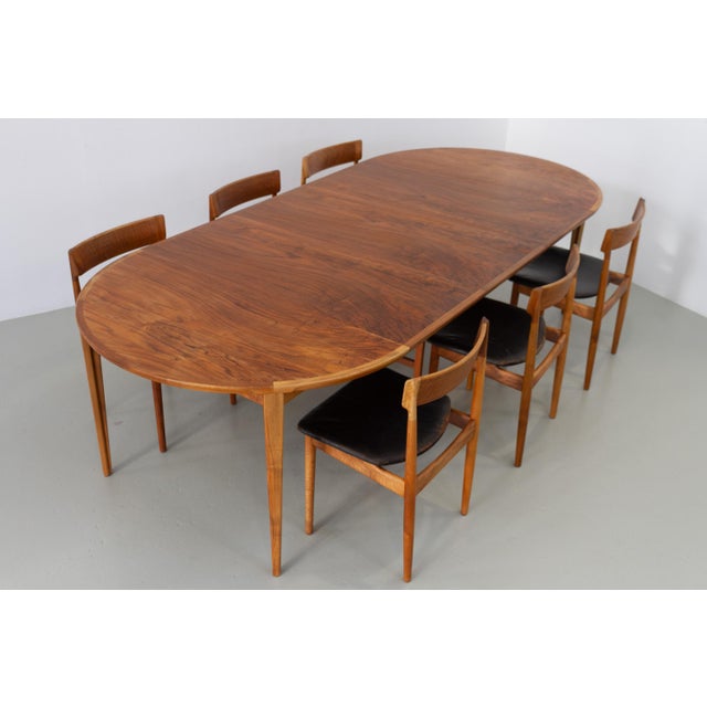 Danish Walnut Dining Room Set by Henry Rosengren Hansen for Brande Møbelfabrik/Møbelindustri, 1960s. Rare and early dining...