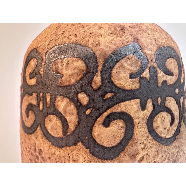 This high-quality ceramic art vase was hand-crafted at the Ceramano workshop in West Germany during the 1960s. The bottle-...