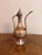 Quality 19th Century antique Middle Eastern copper coffee pot, having a quality 19th century copper coffee pot with a...