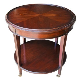 Vintage Mahogany Two-Tier Side Table | Bookmatched Starburst Top | Fluted Legs | Brass Caster Feet For Sale