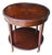 Vintage Mahogany Two-Tier Side Table | Bookmatched Starburst Top | Fluted Legs | Brass Caster Feet For Sale