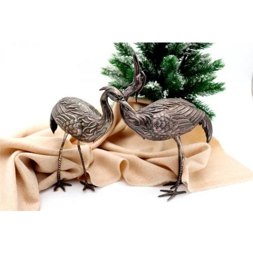 Silver Cranes with Embossed Applications, Set of 2, in Very Good conditions. Designed from 2000 This piece has an...