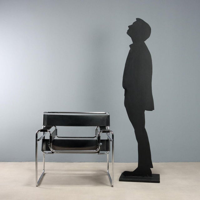 Iconic armchair designed in 1925 by Marcel Breuer for the Constructivist painter Wassily Kandinsky. Made of chromed steel...