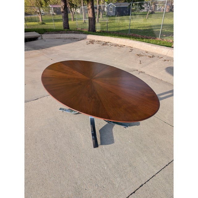 Beautiful dining table with starburst pattern walnut top designed by Osvaldo Borsani for Stow Davis, circa 1970s....