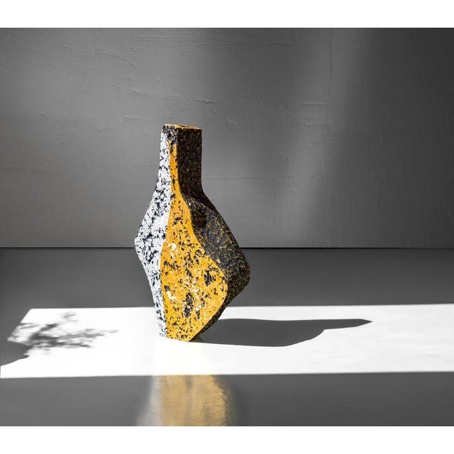 Fragment ochre i sculptural vase by donatas zukauskas. Dimensions: w 27 x d 8.5 x h 48 cm. Materials: handcrafted mineral...