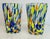 Add vibrant Italian-inspired elegance to your table with this beautiful set of two Hand-Blown Murano Style Art Glass...