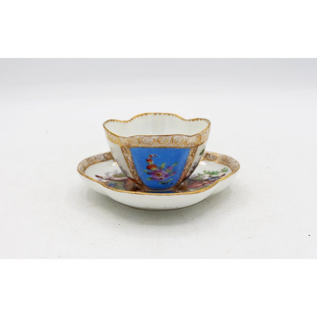 Circa 1888-1916 Richard Klemm, Dresden quatrefoil demitasse cup & saucer. Fully marked. Porcelain. Delicate scroll handle....