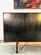Mid Century Modern Walnut Early Florence Knoll Credenza or Sideboard with original black ebonized doors. Long sleek walnut...