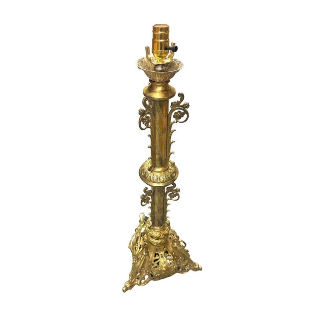 This original Hollywood Regency Neo-Gothic-inspired table lamp is made from solid brass and features dragon figures...