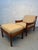Elegant mid-century modern lounge chair and matching ottoman by Dyrlund, showcasing exceptional Danish craftsmanship and...