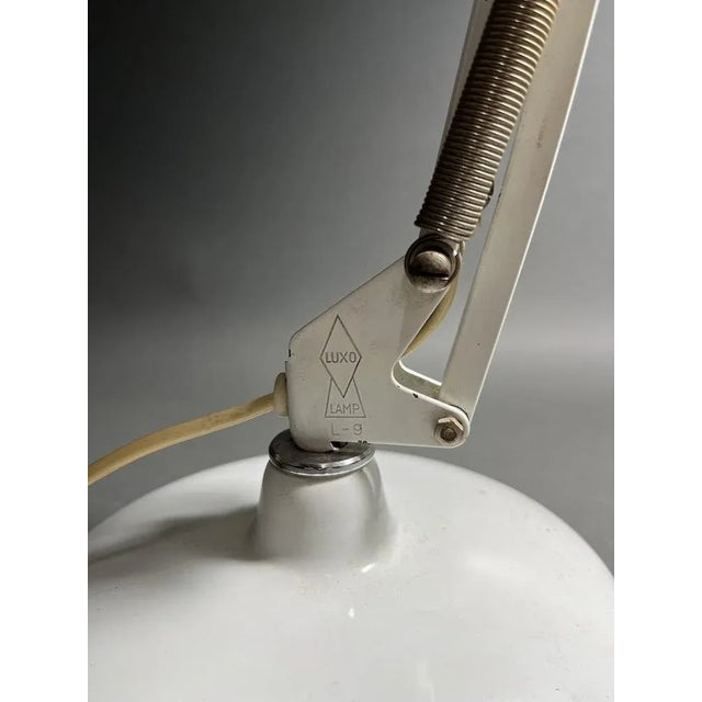 L-9 Table Lamp in Iron, in Very Good conditions. Designed 1960 to 1969 This piece has an attribution mark, I am sure that...