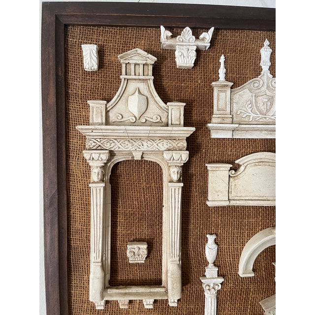 Castings mounted in framed burlap panels. These panels are from Eric Lansdown's collection representing 50 years of...