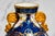 A captivating example of late 19th-century English porcelain artistry, this pair of Victorian vases from the esteemed...