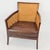 Pair of 2 Crate & Barrel "Blake" chairs with 1 coordinating ottoman. Crafted of teak and handwoven rattan panels, the...