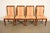 A gorgeous set of four Regency or Neoclassical style dining chairs In the manner of Baker Furniture USA, Circa 1980s...