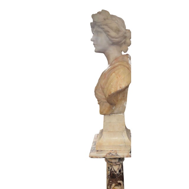 An impressive 19th century carved marble bust of Sappho, the celebrated ancient Greek lyric poet of Lesbos, presented on...