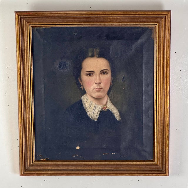 A charming antique portraiture painting of a charming woman. This Mid-Late 19th Century original oil on canvas painting...