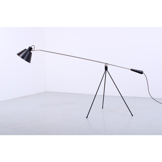 Iconic dutch design classic from the fifties, this magnificent 'magneto' adjustable floor light. it was produced for only...