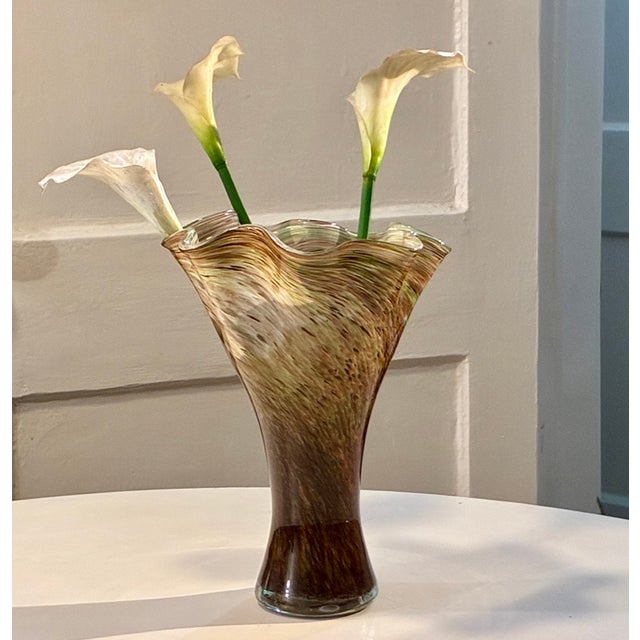 An elegant and highly tactile mid-century Scandinavian art glass vase, hand-blown in Sweden during the late 1960s or...