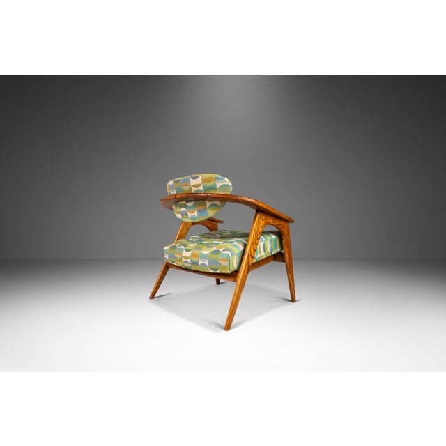 Designed by the incomparable Adrian Pearsall, this iconic Model 916-CC Captain's Chair is the epitome of functional art....