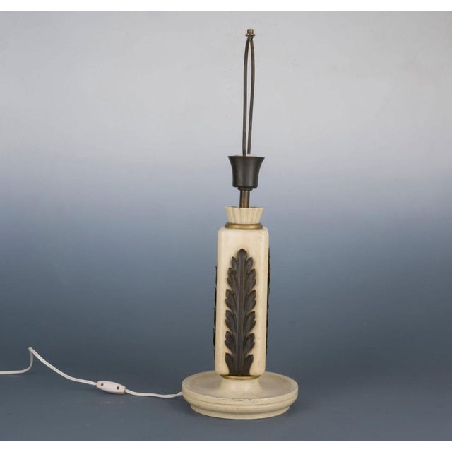 Table Lamp in White Lacquered Wood and Brass Leaves from Osvaldo Borsani, 1940s, in Good conditions. Designed 1920 to 1949...