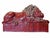 A striking pair of Art Deco-style lions finished in a rich oxblood glaze, showcasing bold sculptural form and streamlined...