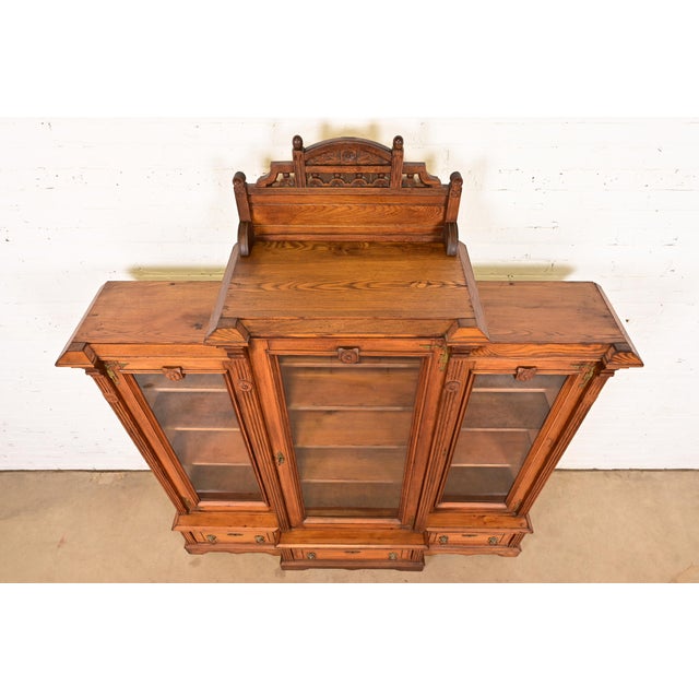Herter Brothers Style Antique Eastlake Victorian Carved Oak Triple Bookcase Cabinet, Circa 1880s For Sale - Image 9 of 12