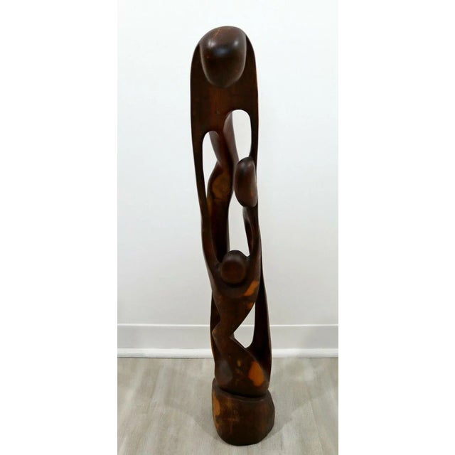 For your consideration is a beautiful, wood carved sculpture or statue of abstracted figures. In excellent vintage...
