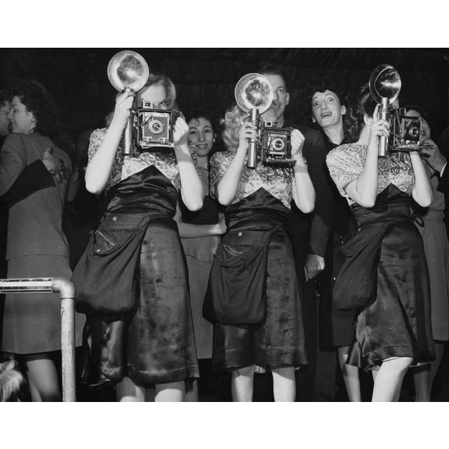 Photo Opportunity Three women, possibly a vocal group, taking photographs with their cameras, 1946. (Photo by Archive...