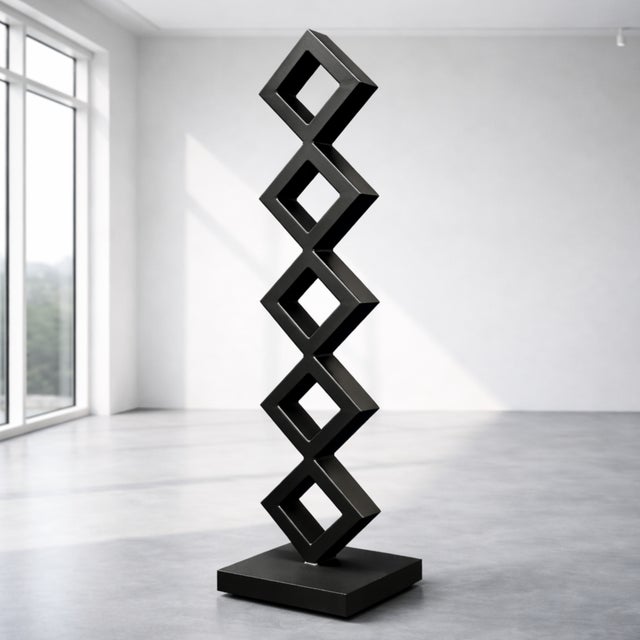 Versa is a contemporary steel sculpture by artist Nicholas Turner, defined by a vertical sequence of rotated square forms...