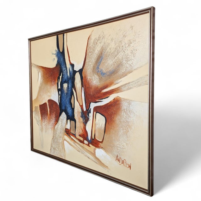 Signed “ANDERSON” at the lower right, this large original oil painting presents an abstract desert landscape through broad...