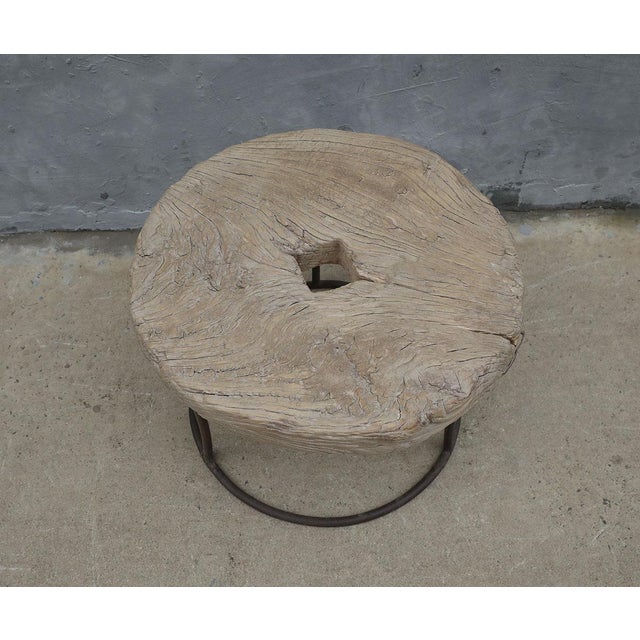 This Vintage Elm Mill Wheel and Iron Side Table is a distinctive fusion of historic architectural salvage and contemporary...
