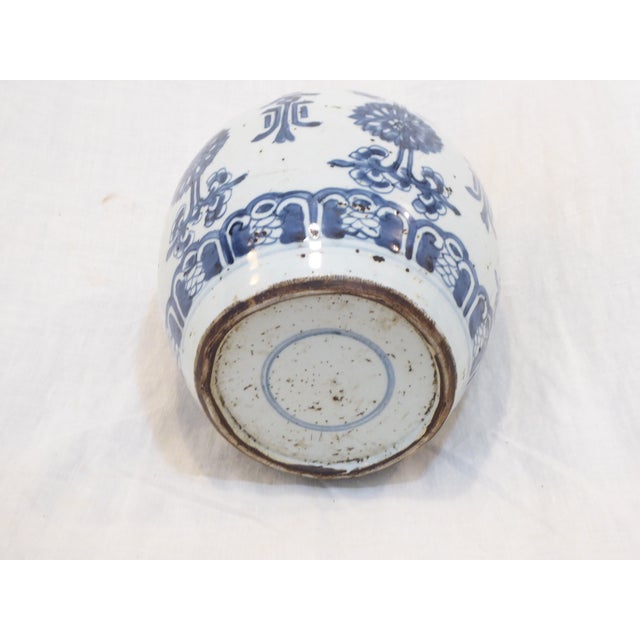 This 19th Century hand thrown and hand painted Chinese blue and white designs.