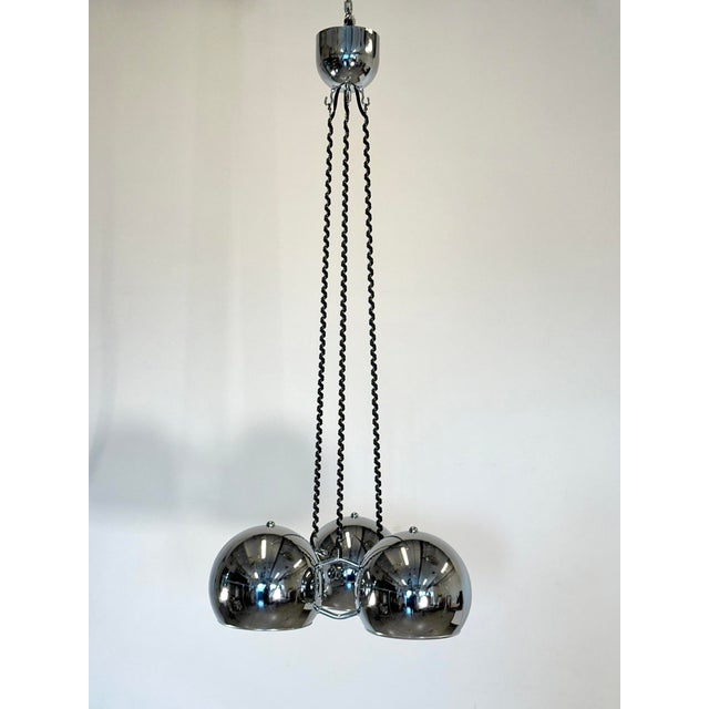 70s space age chandelier by Goffredo Reggiani, 3 chromed steel diffusers This piece is designed in the style of the...