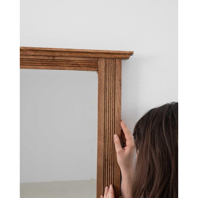 A mirror whose natural honey wood frame, rectangular gives it real character at first glance. Originating in France during...